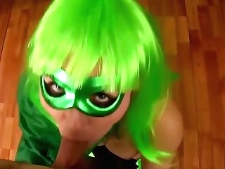 Stunner With Green Hair And A Matching Mask Is Getting On All Fours On The Floor And Sucking Dick